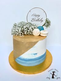 gold and blue Medium cake